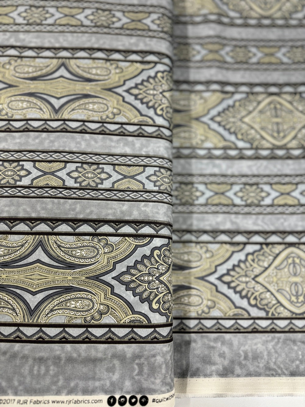 RJR Fabrics - Aruba Border Gray Taupe Fabric