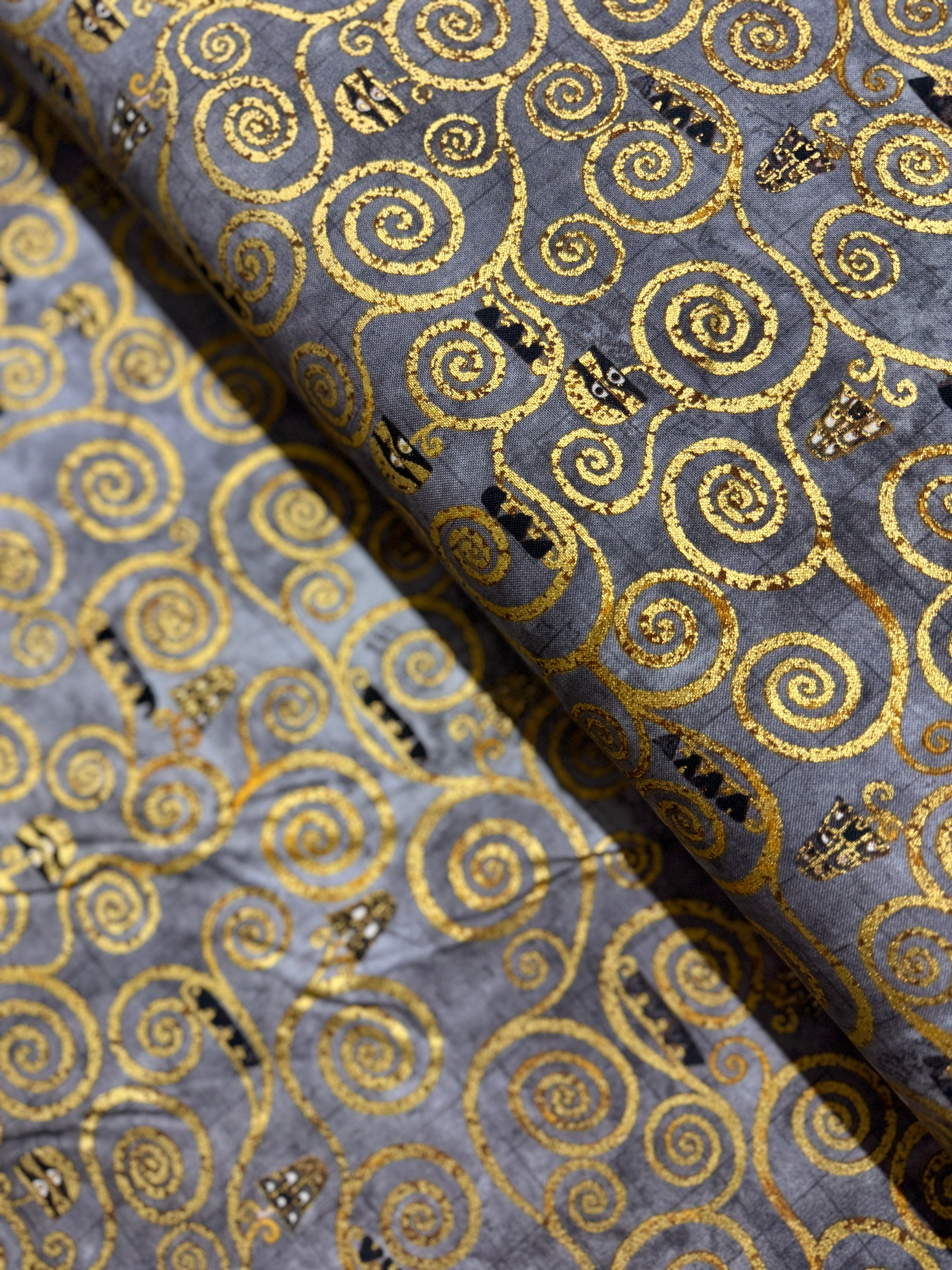 Gustav Klimt - Swirls Charcoal Gold Metallic Yardage