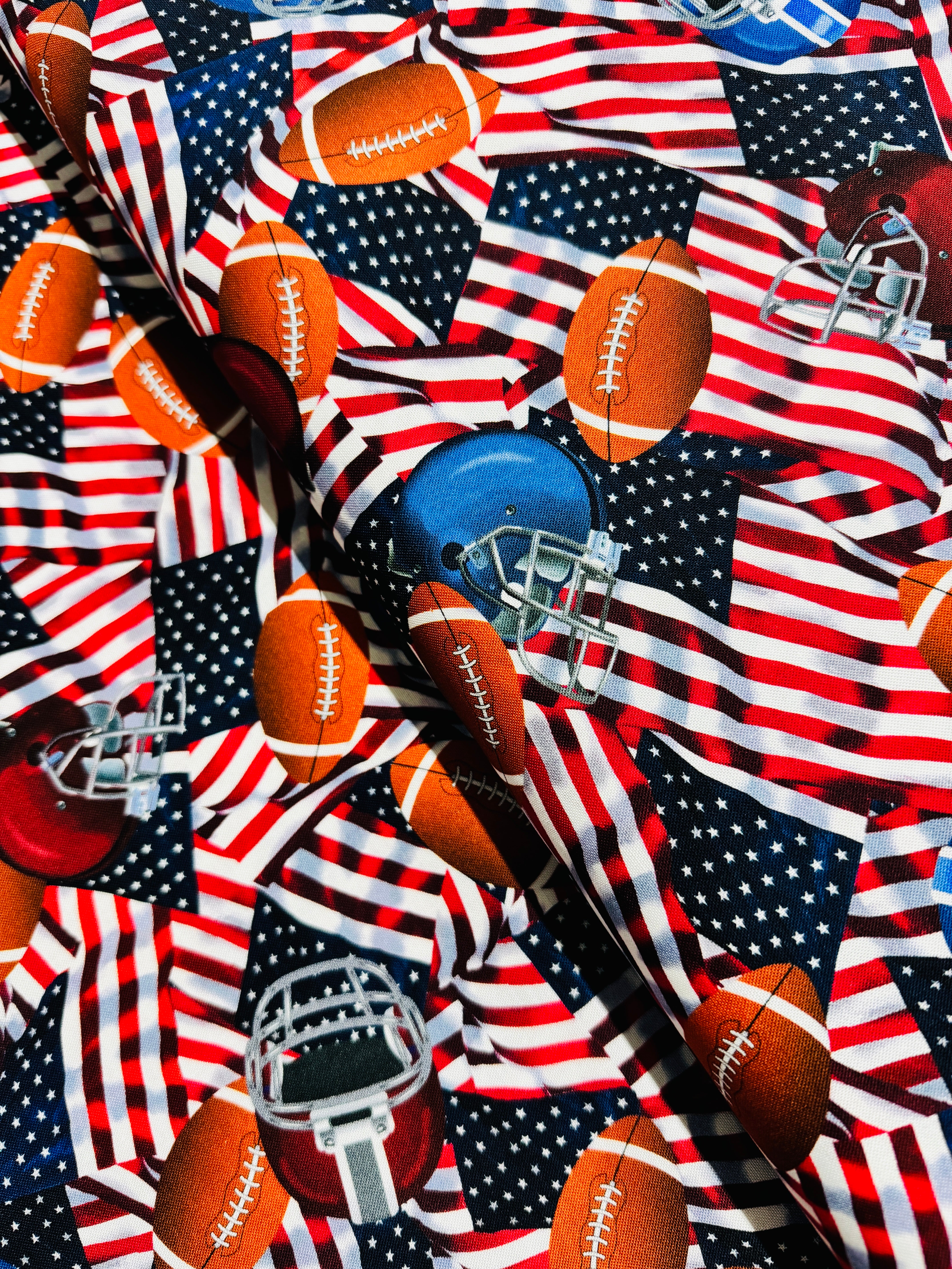 Football Helmets And USA Flags Yardage